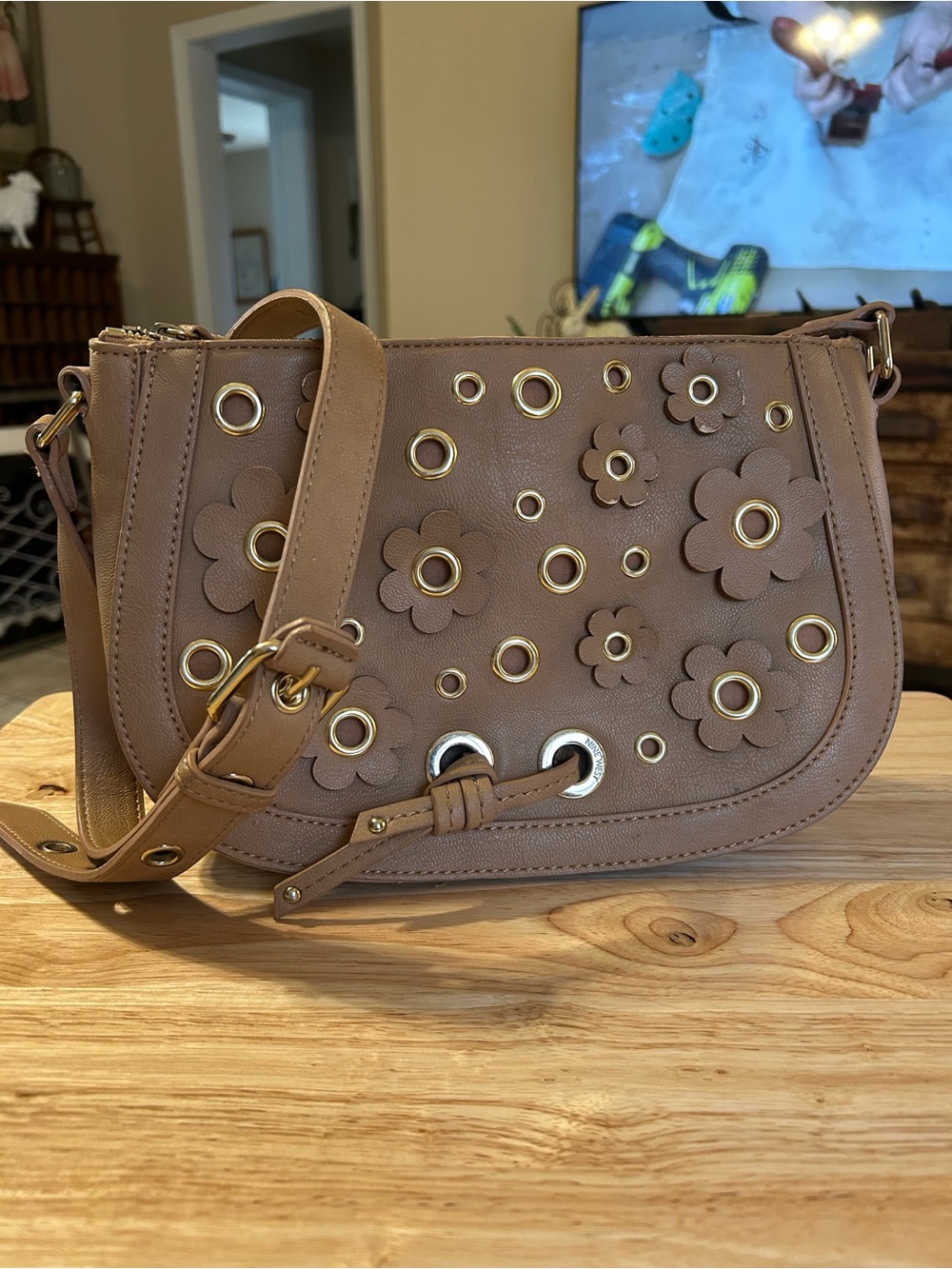 Nine West Evelina 3D Floral Grommet Crossbody Saddle Bag - Tan